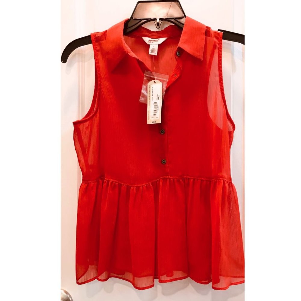 Red Sleeveless Blouse